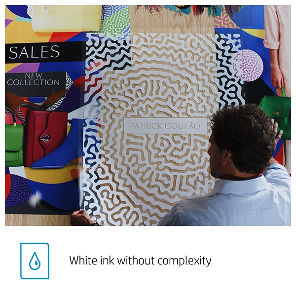 User examining a high-contrast print created with the HP Latex 700 W Printer using white ink technology