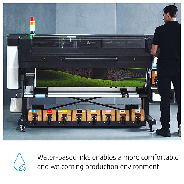 HP Latex 800 Printer producing eco-friendly prints with a technician present