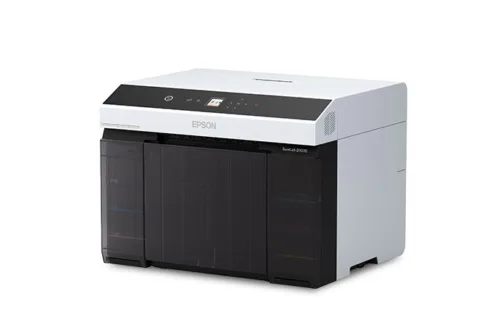 SureLab D1070 Professional Minilab Printer delivering high-quality photo prints in a professional studio